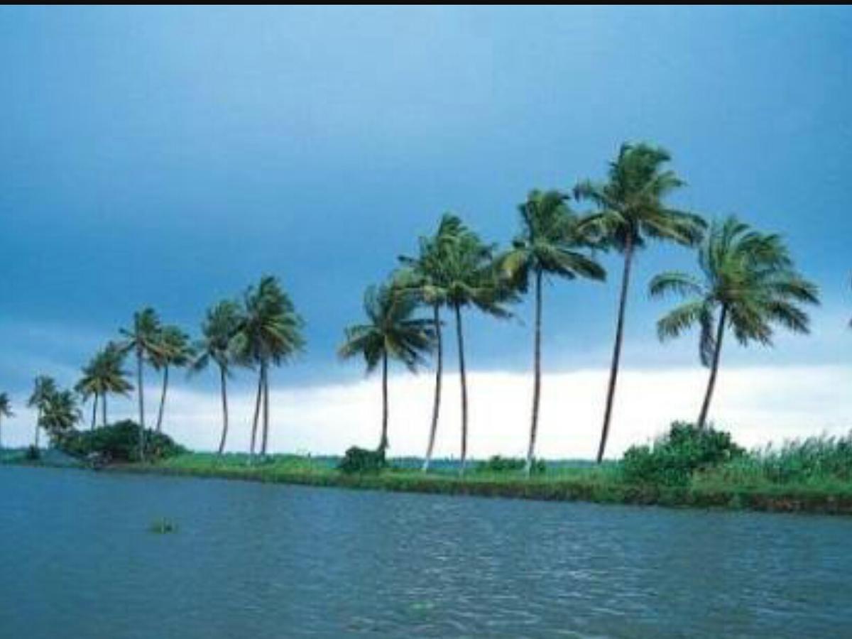 Abru'S Holidays International Travelers Alappuzha Luaran gambar